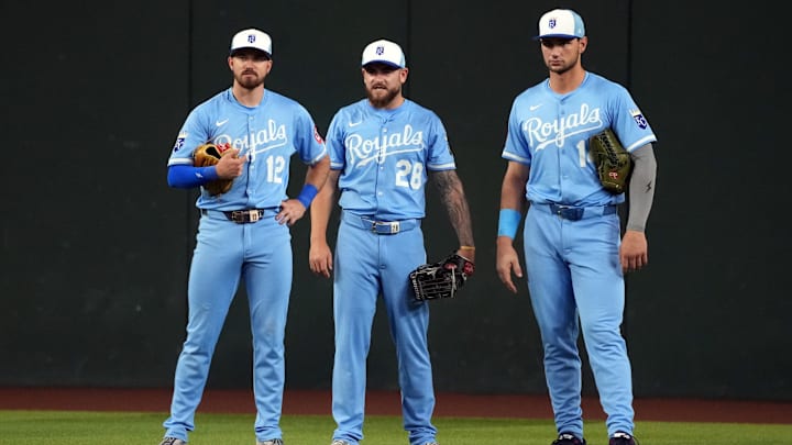 Jul 5, 2025; Phoenix, Arizona, USA; Kansas City Royals left fielder Nick Loftin (12), center fielder Kyle Isbel (28), and Jac Caglianone in the fifth inning against the Arizona Diamondbacks at Chase Field. Mandatory Credit: Rick Scuteri-Imagn Images