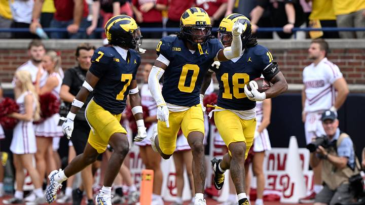 Sep 12, 2026; Ann Arbor, Michigan, USA;  Michigan Wolverines cornerback Jyaire Hill (0) celebrates with teammates after an interception against the Oklahoma Sooners during the fourth quarter at Michigan Stadium.  Mandatory Credit: Lon Horwedel-Imagn Images