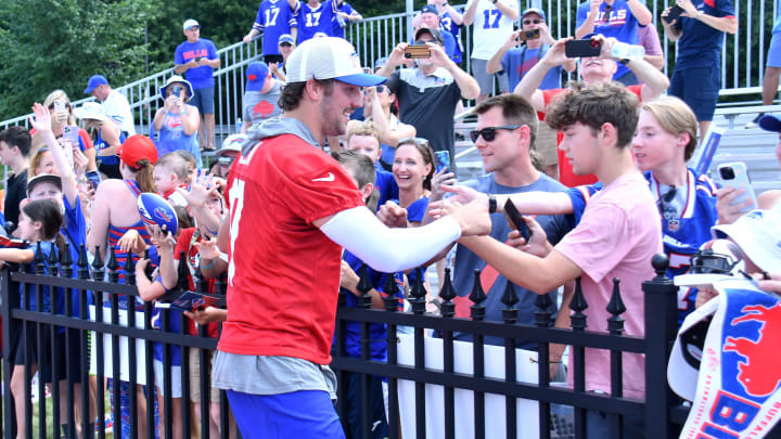Jul 24, 2024; Rochester, NY, USA; Buffalo Bills quarterback Josh Allen (17) greets fans after a training camp session at St. John Fisher University. Jul 24, 2024; Rochester, NY, USA; Buffalo Bills quarterback Josh Allen (17) greets fans after a training camp session at St. John Fisher University.