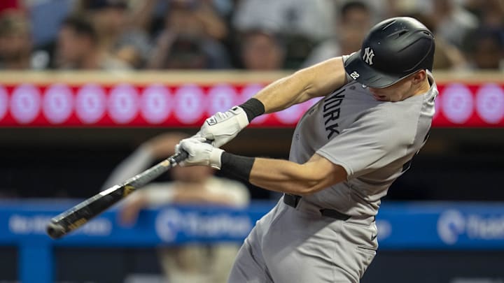 Sep 16, 2025; Minneapolis, Minnesota, USA; New York Yankees first baseman Ben Rice (22) hits a single against the Minnesota Twins in the fifth inning at Target Field. Mandatory Credit: Jesse Johnson-Imagn Images Sep 16, 2025; Minneapolis, Minnesota, USA; New York Yankees first baseman Ben Rice (22) hits a single against the Minnesota Twins in the fifth inning at Target Field. Mandatory Credit: Jesse Johnson-Imagn Images