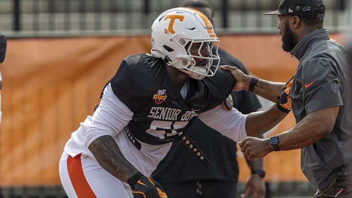 Jan 30, 2025; Mobile, AL, USA; American team defensive lineman Omarr Norman-Lott of Tennessee (55) works through drills during Senior Bowl practice for the American team at Hancock Whitney Stadium. 
