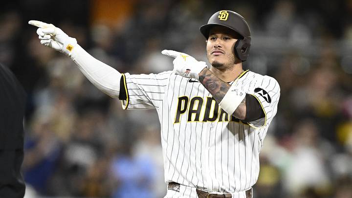 Jun 9, 2026; San Diego, California, USA; San Diego Padres third baseman Manny Machado (13) gestures after hitting a double during the eighth inning against the Cincinnati Reds at Petco Park. Mandatory Credit: Denis Poroy-Imagn Images Jun 9, 2026; San Diego, California, USA; San Diego Padres third baseman Manny Machado (13) gestures after hitting a double during the eighth inning against the Cincinnati Reds at Petco Park. Mandatory Credit: Denis Poroy-Imagn Images