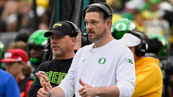 Oregon Ducks head coach Dan Lanning instructs his team from the sideline against the Indiana Hoosiers during the third quarter at Autzen Stadium. 
