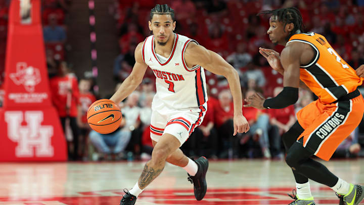 Houston point guard Milos Uzan (with ball)