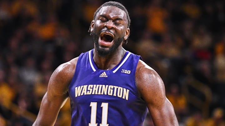 Feb 22, 2025; Iowa City, Iowa, USA; Washington Huskies center Franck Kepnang (11) reacts during the second half against the Iowa Hawkeyes at Carver-Hawkeye Arena. Mandatory Credit: Jeffrey Becker-Imagn Images