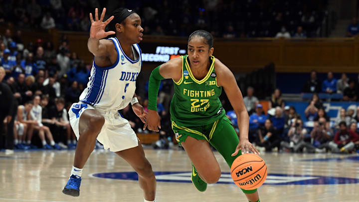  Duck guard Deja Kelly picked up a tryout with the Las Vegas Aces, her shot at a career in the WNBA.