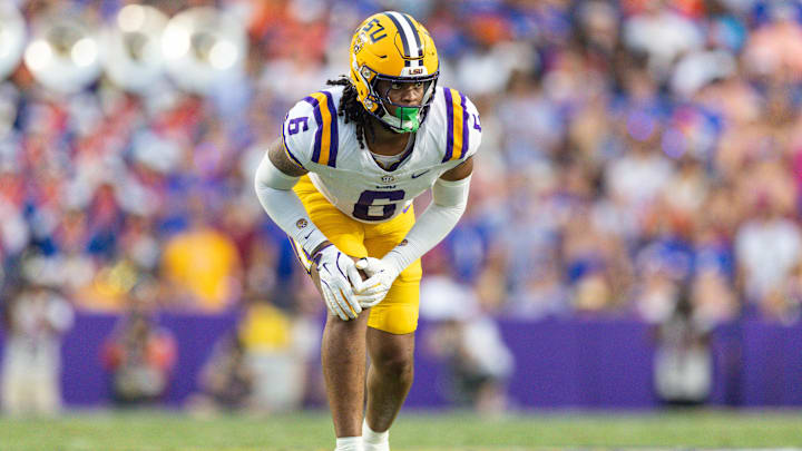 Sep 13, 2025; Baton Rouge, Louisiana, USA;  LSU Tigers defensive end Patrick Payton (6) looks over the Florida Gators offense during the first half at Tiger Stadium. Mandatory Credit: Stephen Lew-Imagn Images