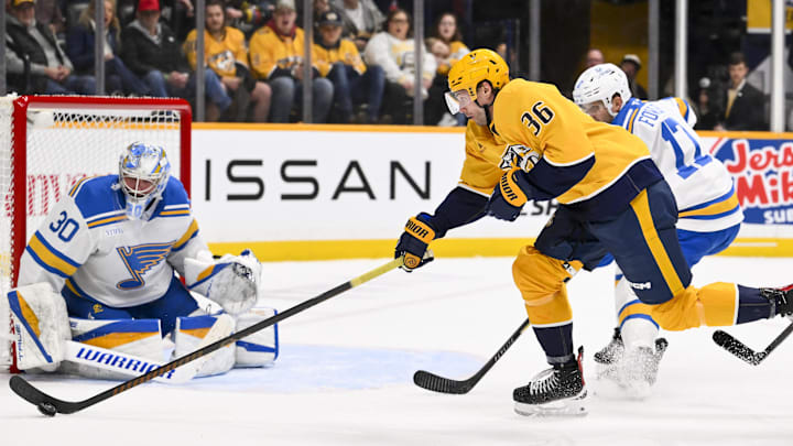 Feb 2, 2026; Nashville, Tennessee, USA; St. Louis Blues goaltender Joel Hofer (30) blocks the shot of Nashville Predators left wing Cole Smith (36) during the second period at Bridgestone Arena. Mandatory Credit: Steve Roberts-Imagn Images Feb 2, 2026; Nashville, Tennessee, USA; St. Louis Blues goaltender Joel Hofer (30) blocks the shot of Nashville Predators left wing Cole Smith (36) during the second period at Bridgestone Arena. Mandatory Credit: Steve Roberts-Imagn Images