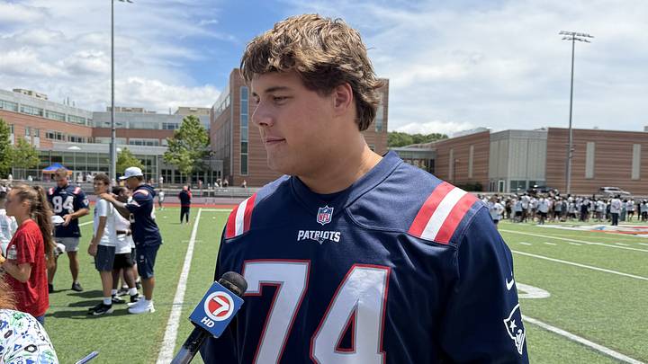 New England Patriots offensive tackle Caleb Lomu speaks to the media following the team's Juneteenth football clinic. New England Patriots offensive tackle Caleb Lomu speaks to the media following the team's Juneteenth football clinic.