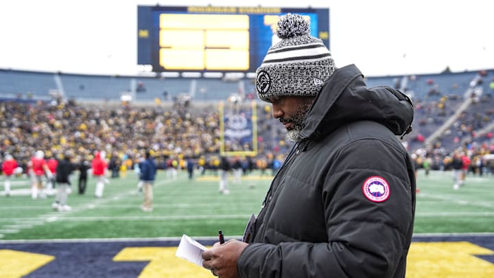 Detroit Lions general manager Brad Holmes watches warmups between Michigan and Ohio State at Michigan Stadium in Ann Arbor on Saturday, Nov. 29, 2025.