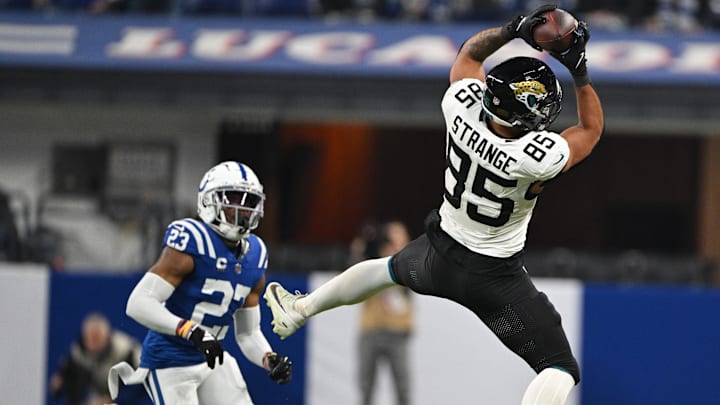 Jan 5, 2025; Indianapolis, Indiana, USA; Jacksonville Jaguars tight end Brenton Strange (85) jumps to catch a ball in front of Indianapolis Colts cornerback Kenny Moore II (23) during the second half at Lucas Oil Stadium. Mandatory Credit: Marc Lebryk-Imagn Images Jan 5, 2025; Indianapolis, Indiana, USA; Jacksonville Jaguars tight end Brenton Strange (85) jumps to catch a ball in front of Indianapolis Colts cornerback Kenny Moore II (23) during the second half at Lucas Oil Stadium. Mandatory Credit: Marc Lebryk-Imagn Images