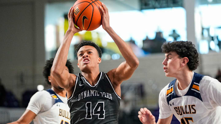 Dynamic Prep guard Ryan Hampton (14) drives to the basket during the second quarter of the City of Palms Classic signature series championship game against the Bullis Bulldogs at Suncoast Credit Union Arena in Fort Myers, Fla., on Sunday, Dec. 22, 2024.