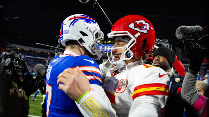 Kansas City Chiefs quarterback Patrick Mahomes (15) greets Buffalo Bills quarterback Josh Allen.