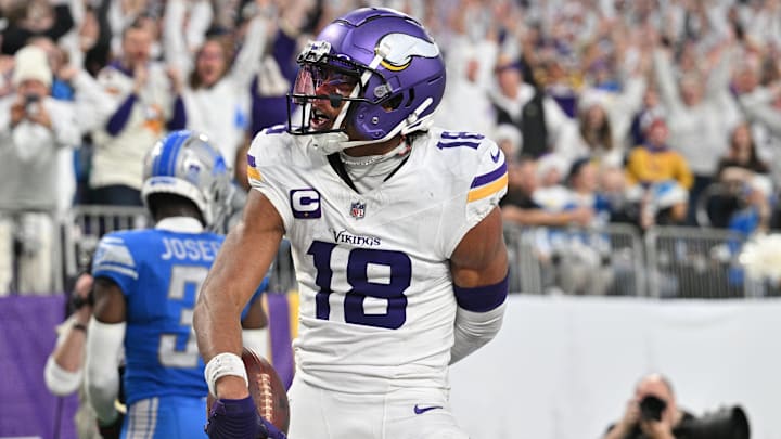Dec 24, 2023; Minneapolis, Minnesota, USA; Minnesota Vikings wide receiver Justin Jefferson (18) reacts after scoring a touchdown during the second quarter against the Detroit Lions at U.S. Bank Stadium.