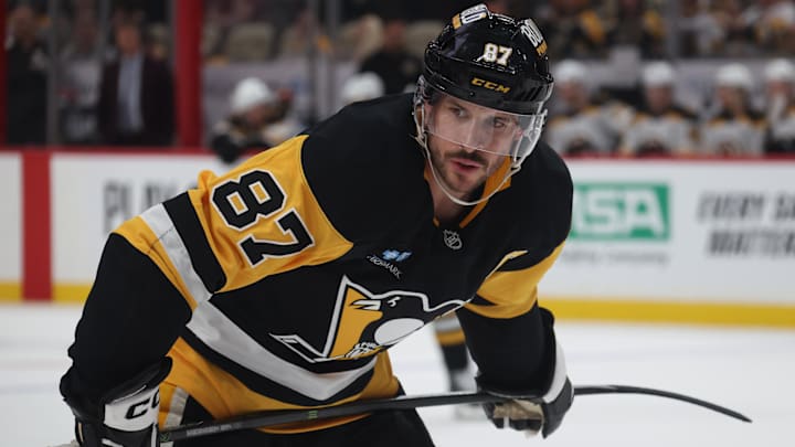 Apr 13, 2025; Pittsburgh, Pennsylvania, USA;  Pittsburgh Penguins center Sidney Crosby (87) looks on before a face-off against the Boston Bruins during the third period at PPG Paints Arena. Mandatory Credit: Charles LeClaire-Imagn Images