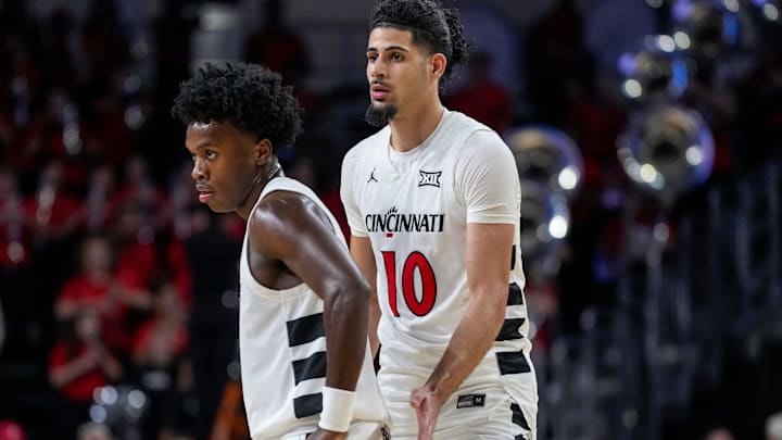 The Cincinnati Bearcats celebrate a win in the second half of the NCAA men’s basketball game between the Cincinnati Bearcats and the Western Carolina Catamounts at Fifth Third Arena in Cincinnati on Monday, Nov. 3, 2025. The Bearcats won 94-63.