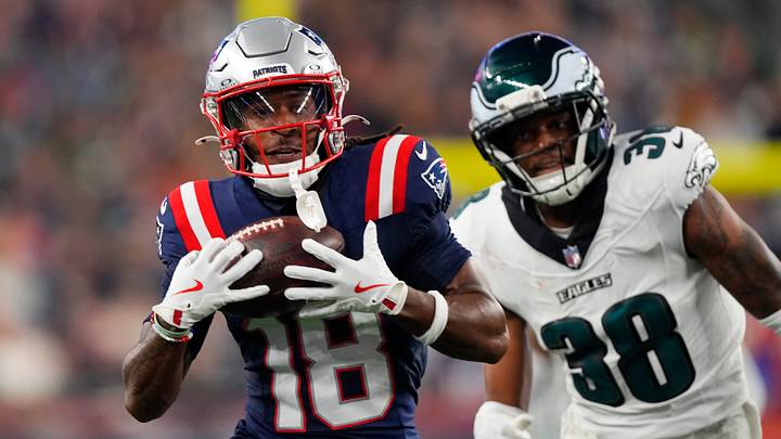 Aug 22, 2026; Foxborough, Massachusetts, USA; New England Patriots wide receiver Kyle Williams (18) catches a pass against Philadelphia Eagles cornerback Ambry Thomas (38) and runs for a touchdown during the first half at Gillette Stadium. Mandatory Credit: Gregory Fisher-Imagn Images
