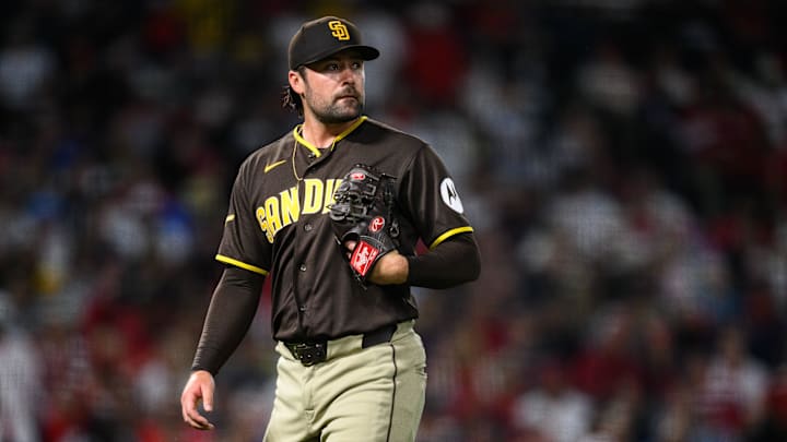 Apr 17, 2026; Anaheim, California, USA; San Diego Padres pitcher Matt Waldron (61) looks on after a pitching change during the fourth inning against the Los Angeles Angels at Angel Stadium. Mandatory Credit: William Liang-Imagn Images