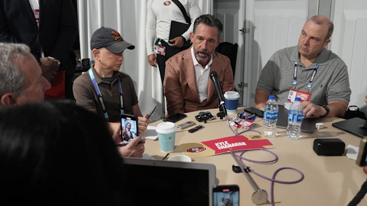 Apr 1, 2025; Palm Beach, FL, USA; San Francisco 49ers head coach Kyle Shanahan answers questions from the media during the NFL Annual League Meeting at The Breakers. Mandatory Credit: Jim Rassol-Imagn Images Apr 1, 2025; Palm Beach, FL, USA; San Francisco 49ers head coach Kyle Shanahan answers questions from the media during the NFL Annual League Meeting at The Breakers. Mandatory Credit: Jim Rassol-Imagn Images