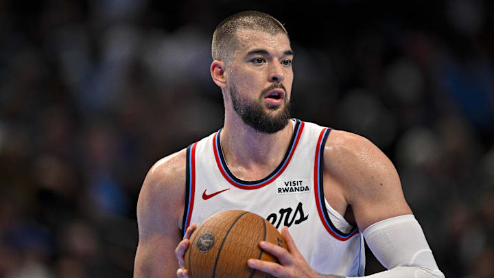 Nov 14, 2025; Dallas, Texas, USA; LA Clippers center Ivica Zubac (40) looks to pass the ball during the second quarter against the Dallas Mavericks in an NBA Cup game at the American Airlines Center. 