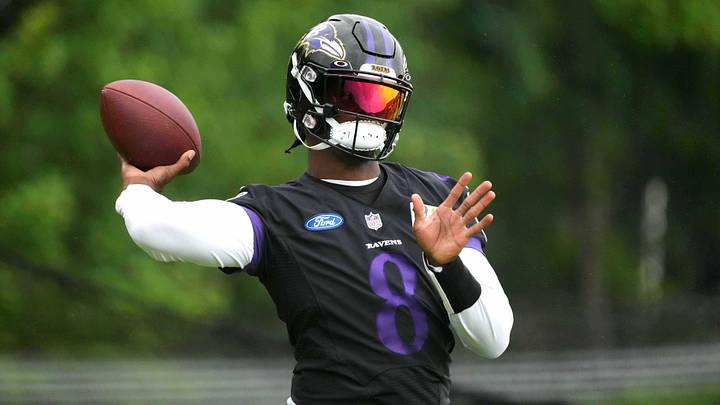 Jul 29, 2022; Owings Mills, MD, USA; Baltimore Ravens quarterback Lamar Jackson (8) practices at the Under Armour Performance Center. Mandatory Credit: Mitch Stringer-Imagn Images