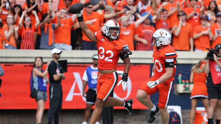 Aug 29, 2026; Charlottesville, Virginia, USA; Virginia Cavaliers linebacker Landon Danley (32) celebrates a fumble recovery during the second quarter against the North Carolina State Wolfpack at Scott Stadium. Mandatory Credit: Greg Atkins-Imagn Images Aug 29, 2026; Charlottesville, Virginia, USA; Virginia Cavaliers linebacker Landon Danley (32) celebrates a fumble recovery during the second quarter against the North Carolina State Wolfpack at Scott Stadium. Mandatory Credit: Greg Atkins-Imagn Images