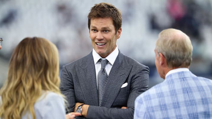 Oct 13, 2024; Arlington, Texas, USA; Fox Sports  broadcaster Tom Brady speaks to colleagues Erin Andrews and Tom Rinaldi before the game between the Dallas Cowboys and Detroit Lions at AT&T Stadium. Mandatory Credit: Kevin Jairaj-Imagn Images