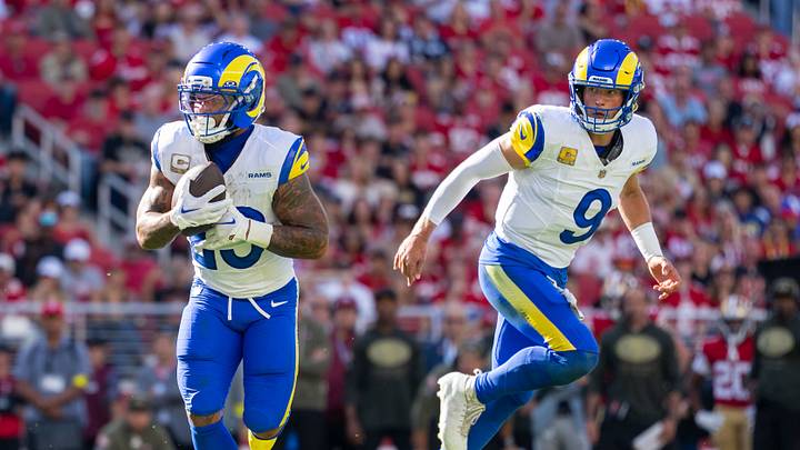 November 9, 2025; Santa Clara, California, USA; Los Angeles Rams running back Kyren Williams (23) runs the football in front of quarterback Matthew Stafford (9) during the first quarter against the San Francisco 49ers at Levi's Stadium. Mandatory Credit: Kyle Terada-Imagn Images