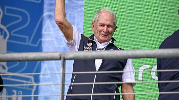 Oct 23, 2022; Austin, Texas, USA; Helmut Marko of Red Bull Racing Team holds up the World Constructors' Champions trophy after the running of the U.S. Grand Prix F1 race at Circuit of the Americas. Mandatory Credit: Jerome Miron-Imagn Images