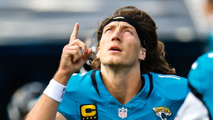 Jacksonville Jaguars quarterback Trevor Lawrence (16) runs onto the field before the start of an NFL football AFC Wild Card playoff matchup, Sunday, Jan. 11, 2026, in Jacksonville, Fla. Bills lead 10-7 at the half over the Jaguars.