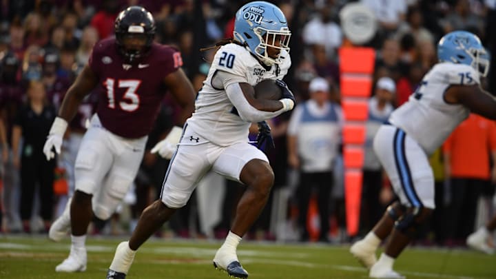 Sep 13, 2025; Blacksburg, Virginia, USA; Old Dominion running back Trequan Jones (20) runs the ball during the first quarter at Lane Stadium.