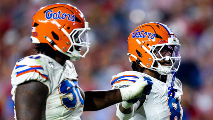 Florida defenders Brendan Bett (90) and Aaron Chiles (8) will be two of the main contributors on defense for the Gators next season.