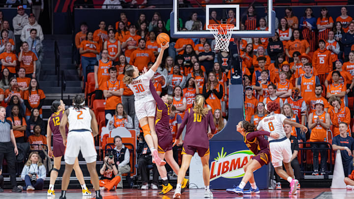 Illinois forward Cearah Parchment (30) goes for a finish at the rim against Minnesota in the Illini's 78-73 loss to No. 22 Minnesota on Sunday at the State Farm Center in Champaign, Illinois.