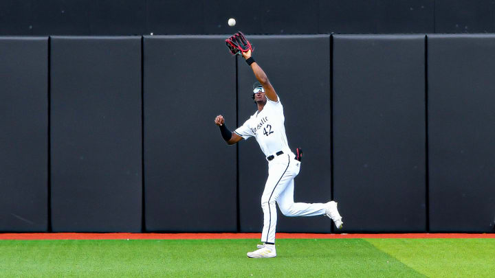 Louisville center fielder Eddie King Jr. (42) Louisville center fielder Eddie King Jr. (42)