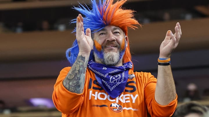 Nov 8, 2025; New York, New York, USA; A New York Islanders fan at Madison Square Garden. Mandatory Credit: Wendell Cruz-Imagn Images Nov 8, 2025; New York, New York, USA; A New York Islanders fan at Madison Square Garden. Mandatory Credit: Wendell Cruz-Imagn Images