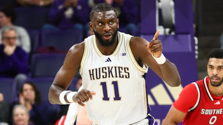 Washington Huskies center Franck Kepnang (11)