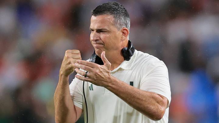Sep 20, 2025; Miami Gardens, Florida, USA; Miami Hurricanes head coach Mario Cristobal reacts against the Florida Gators during the first quarter at Hard Rock Stadium. Mandatory Credit: Sam Navarro-Imagn Images