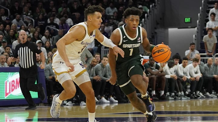 Jan 12, 2025; Evanston, Illinois, USA; Northwestern Wildcats guard Ty Berry (3) defend Michigan State Spartans guard Jeremy Fears Jr. (1) during the first half at Welsh-Ryan Arena. Mandatory Credit: David Banks-Imagn Images