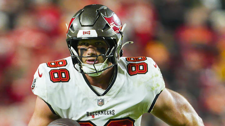 Nov 4, 2024; Kansas City, Missouri, USA; Tampa Bay Buccaneers tight end Cade Otton (88) runs with the ball during the second half against the Kansas City Chiefs at GEHA Field at Arrowhead Stadium. Mandatory Credit: Jay Biggerstaff-Imagn Images