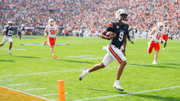 Auburn Tigers quarterback Deuce Knight (9) run in for a touchdown on the first play of the game as Auburn Tigers take on Mercer Bears at Jordan-Hare Stadium in Auburn, Ala. on Saturday, Nov. 22, 2025. Auburn Tigers quarterback Deuce Knight (9) run in for a touchdown on the first play of the game as Auburn Tigers take on Mercer Bears at Jordan-Hare Stadium in Auburn, Ala. on Saturday, Nov. 22, 2025.