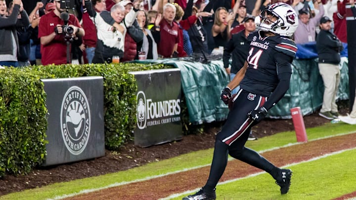 Nov 16, 2024; Columbia, South Carolina, USA; South Carolina Gamecocks wide receiver Jared Brown (14) celebrates a touchdown against the Missouri Tigers in the second half at Williams-Brice Stadium. Mandatory Credit: Jeff Blake-Imagn Images