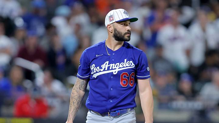 Jul 25, 2026; New York City, New York, USA; Los Angeles Dodgers relief pitcher Tanner Scott (66) reacts during the eighth inning against the New York Mets at Citi Field. Mandatory Credit: Brad Penner-Imagn Images