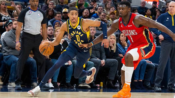 Nov 7, 2022; Indianapolis, Indiana, USA; Indiana Pacers guard Tyrese Haliburton (0) dribbles the ball while New Orleans Pelicans forward Zion Williamson (1) defends in the second half at Gainbridge Fieldhouse. Mandatory Credit: Trevor Ruszkowski-USA TODAY Sports Nov 7, 2022; Indianapolis, Indiana, USA; Indiana Pacers guard Tyrese Haliburton (0) dribbles the ball while New Orleans Pelicans forward Zion Williamson (1) defends in the second half at Gainbridge Fieldhouse. Mandatory Credit: Trevor Ruszkowski-USA TODAY Sports