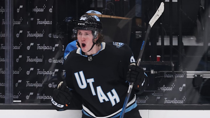 Utah Hockey Club center Logan Cooley celebrates a goal against the Winnipeg Jets during the second period at Delta Center.