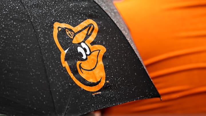 Aug 22, 2021; Baltimore, Maryland, USA; A Baltimore Orioles logo is seen on an umbrella during the game between the Baltimore Orioles and the Atlanta Braves at Oriole Park at Camden Yards. Mandatory Credit: Scott Taetsch-Imagn Images
