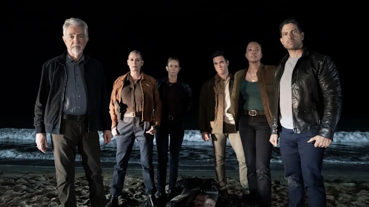 L-R: BTS of Joe Mantegna as David Rossi, Paget Brewster as Emily Prentiss, A.J. Cook as Jennifer ‘JJ’ Jareau, RJ Hatanaka as Tyler Green, Aisha Tyler as Dr. Tara Lewis, and Adam Rodriguez as Luke Alvez on the set of Criminal Minds: Evolution, episode 1, season 18 streaming on Paramount+, 2025. Photo Credit: Michael Yarish/Paramount+