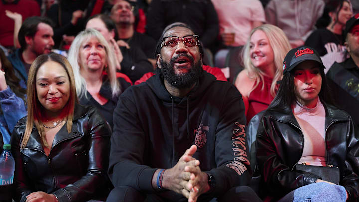 Dec 28, 2024; Portland, Oregon, USA; Former Portland Trail Blazers Greg Oden is recognized during a time out in the first half during a game against the Dallas Mavericks at Moda Center. Mandatory Credit: Troy Wayrynen-Imagn Images