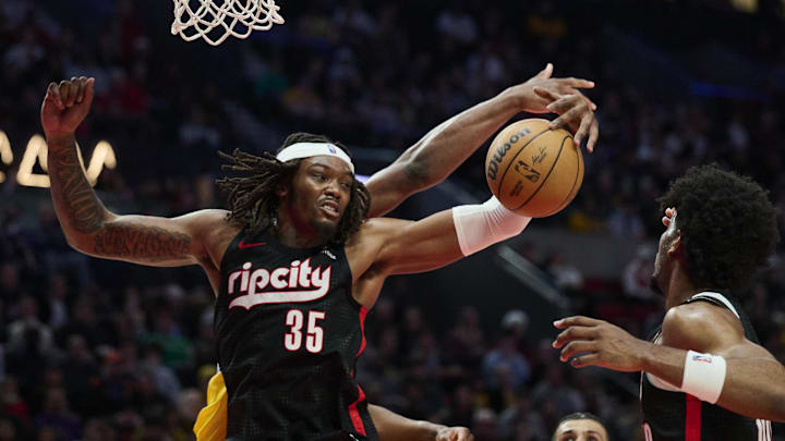 Feb 20, 2025; Portland, Oregon, USA; Portland Trail Blazers center Robert Williams III (35) grabs a rebound during the second half against the Los Angeles Lakers at Moda Center. Mandatory Credit: Troy Wayrynen-Imagn Images
