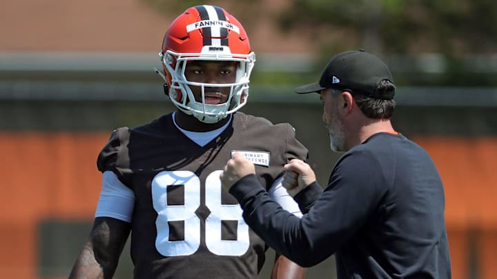 Cleveland Browns tight end Harold Fannin Jr. works with coach Kevin Stefanski during Day 2 of rookie minicamp, May 10, 2025, in Berea.