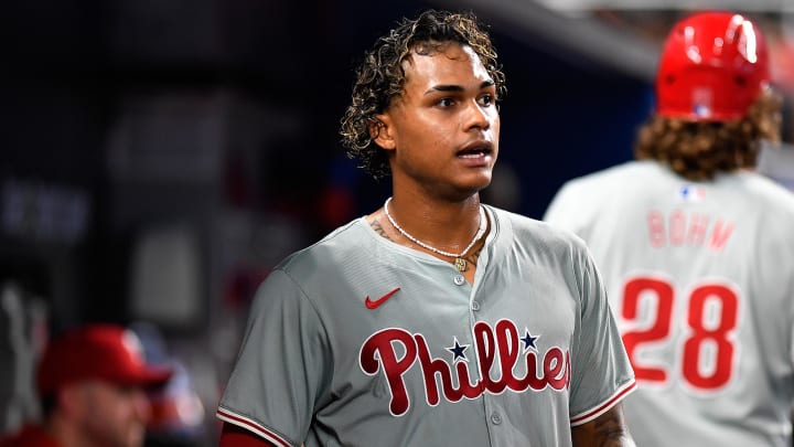 May 11, 2024; Miami, Florida, USA;  Philadelphia Phillies outfielder Cristian Pache (19) watches his team play the Miami Marlins during the ninth inning at loanDepot Park